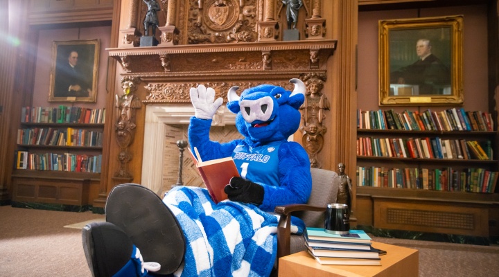 Victor E Bull in a library. 