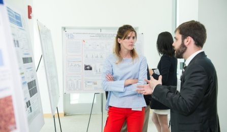 GGB PhD student Karstin Webber listening during poster presentation. 