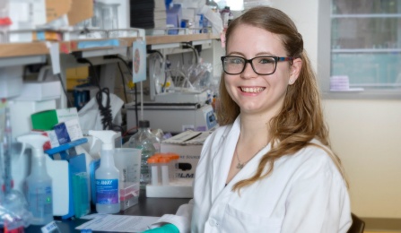 Alumnus in a lab. 
