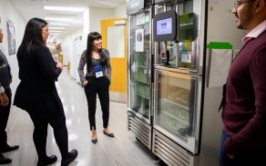 Students gathered in a lab. 