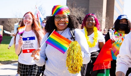 People celebrating during Pride Week. 