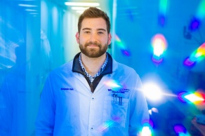 Student in a lab coat.