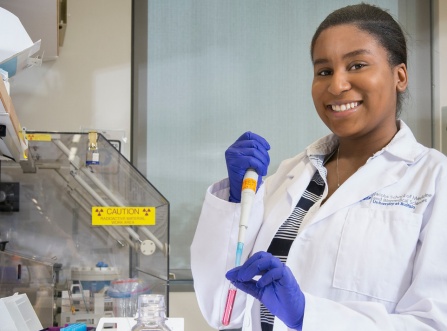 Tanzania Bussey in a lab. 