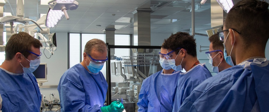 Faculty member training residents. 