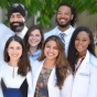 Group of medical students outside in their white coats. 