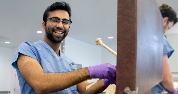 Medical student in gross anatomy lab. 