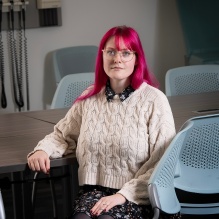 Eleanora Stuart sitting in a classroom. 