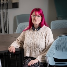 Eleanora Stuart sitting in a classroom. 