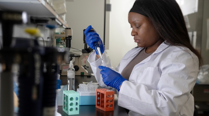 student working in a lab. 