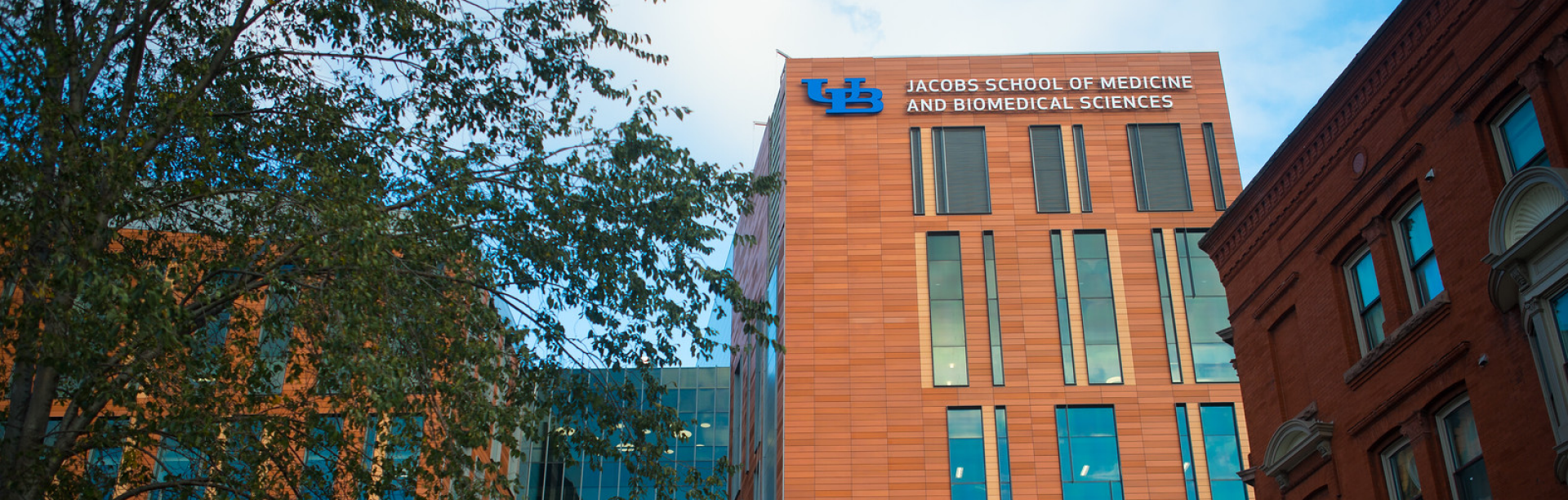 Exterior of the Jacobs School of Medicine and Biomedical Sciences building.