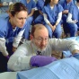 Students at a demonstration in the Gross Anatomy lab. 