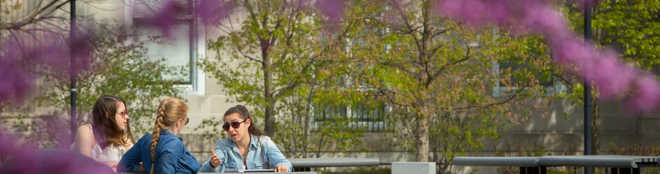 students working outside on south campus. 