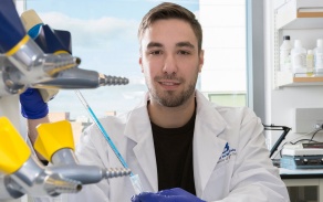 Pharmacology student working in lab. 