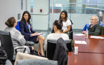 Dr. Meka, Director of the Medical Education and Educational Research Institute, participating in a faculty development activity with 4 colleagues. 