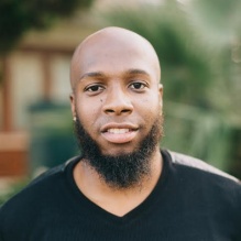 Aswad Thomas headshot. 