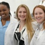 Residents wearing their long white coats before the ceremony. 