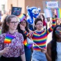 students and faculty at pride parade. 