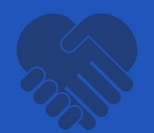 Two hands shaking forming the shape of a heart. 