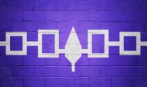 Zoom image: Painted Flag of the Iroquois Confederacy on a brick wall