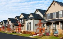 Street view of a row of houses. 