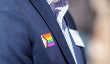LGBTQ pin on a jacket. 