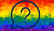 horizontal Rainbow colored pixeled background with a blue talking bubble with a question mark in the center of it. 