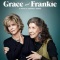 Two older women (Grace and Frankie) laughing side by side. 