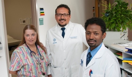 Dr. Roberto Diaz Del Carpio (center), Department of Medicine, serves as an advocate. 