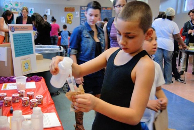 Children participate in science experiments.