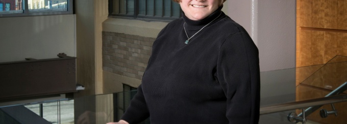 Brooke Lerne standing in a corridor.